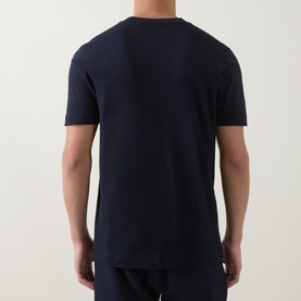 Model wearing Boss Black Casual Thompson Logo T-Shirt in dark blue, back view, crew neck, short sleeves, 100% cotton