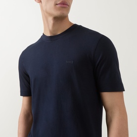Model wearing Boss Black Casual Thompson Logo T-Shirt in dark blue, crew neck with tonal chest logo, short sleeves, cotton finish