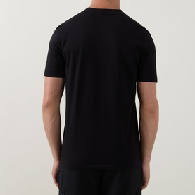 Model wearing Boss Black Casual black crew neck T-shirt, rear view, short sleeves, plain back in 100% cotton jersey