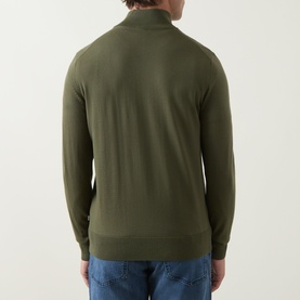 Model wearing Boss Black Casual Ebenji Half-Zip Sweater in Open Green, back view, styled with blue jeans.