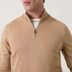 Model wearing Boss Black Casual Benji Half-Zip Sweater in medium beige, featuring high neckline and zip pull, styled with white crew-neck tee