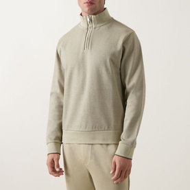Model wearing Boss Black Casual Sidney Half-Zip Sweatshirt in dark beige with ribbed trims, styled with matching beige joggers.