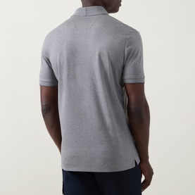 Model wearing Boss Black Casual Parlay Logo Polo Shirt in Open Grey, rear view showing straight hem and side split detail