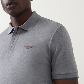Model wearing Boss Black Casual Parlay Logo Polo Shirt in Open Grey, showing chest logo detail and polo collar with concealed placket.