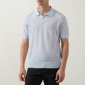 Model wearing Boss Black Casual H Lantoni Logo Polo Sweater in Open Blue, fine-knit wool with polo collar and short sleeves, styled with black