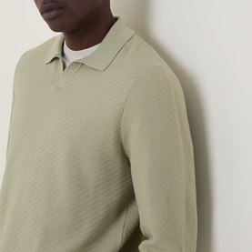 Model wearing Boss Black Casual H Lomarino Logo Polo Sweater in dark beige, featuring polo collar, long sleeves and textured-knit construction