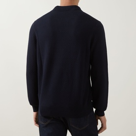 Model wearing Boss Black Casual H Lomarino Logo Polo Sweater in dark blue, rear view showing long sleeves and ribbed trims