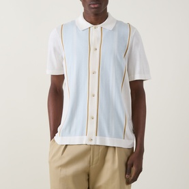 Model wearing Boss Black Casual Lastro Colour-Blocked Shirt in Open White with blue panel and gold trim detailing, styled with beige trousers