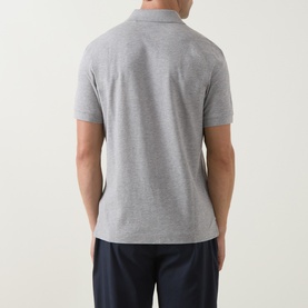 Model wearing Boss Black Casual polo in Open Grey, back view, short sleeves, piqu&eacute; cotton, styled with navy trousers