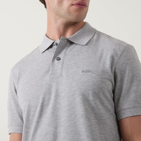 Model wearing Boss Black Casual open grey cotton polo shirt, close-up showing ribbed collar, two-button placket and embroidered logo