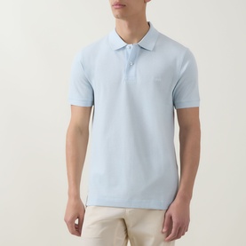 Model wearing Boss Black Casual Open Blue cotton polo shirt with short sleeves and two-button placket, styled with beige chinos