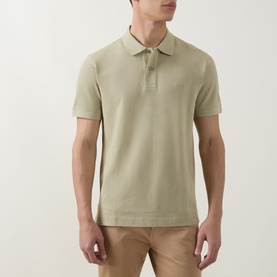 Model wearing Boss Black Casual dark beige cotton polo shirt with ribbed collar and short sleeves, styled with stone chinos