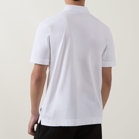 Model wearing Boss Black Casual Parris Logo Polo Shirt in white, back view showing straight hem, side splits and logo tag