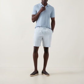 Model wearing Boss Black Casual Peter C Drawstring Shorts in Open Blue, styled with matching light blue polo and dark espadrilles