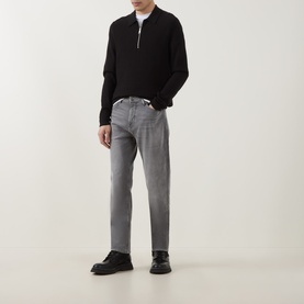 Model wearing Boss Black Casual medium grey straight jeans, styled with a black zip-neck knit and black leather shoes.