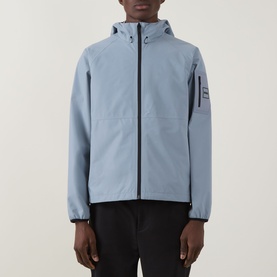 Model wearing Boss Green Label Visit JT Logo Jacket in dark grey, hooded zip-up style with sleeve pocket, styled with black trousers