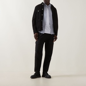 Model wearing Boss Green Label Dark Grey casual cotton shirt, styled with black jacket, trousers and leather shoes.