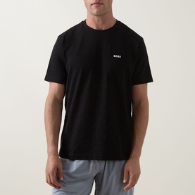 Model wearing Boss Green Label black crew neck T-shirt with small chest logo, styled with grey shorts