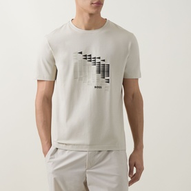 Model wearing Boss Green Label light beige crew neck T-shirt with abstract graphic print, styled with matching beige shorts.