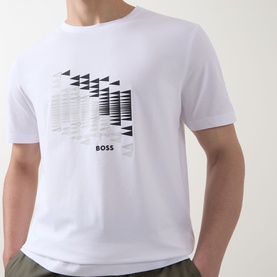 Model wearing Boss Green Label white crew neck T-shirt with geometric triangle and stripe graphic print on chest