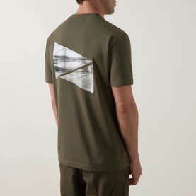 Model wearing Boss Green Label Open Green crew neck T-shirt, back view showing geometric graphic print, styled with matching joggers.