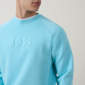 Model wearing Boss Green Label Open Blue cotton crew neck sweatshirt with tonal embossed BOSS logo at chest