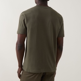 Model wearing Boss Green Label Open Green cotton crew neck T-shirt, rear view, styled with matching trousers.
