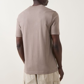 Model wearing Boss Green Label Light/Pastel Green cotton crew neck T-shirt, back view, styled with casual trousers.