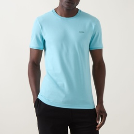 Model wearing Boss Green Label Taul Logo T-Shirt in Open Blue, crew neck, short sleeves, with black trousers