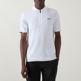 Model wearing Boss Green Label Ever-X Logo Zip Polo Shirt in white, short sleeves, zip collar, small contrast logo detail on chest.