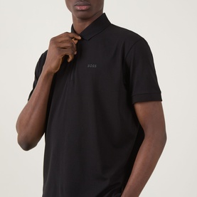 Model wearing Boss Green Label Urban Tech Logo Polo Shirt in black with half-zip placket and tonal logo detail at chest
