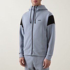 Model wearing Boss Green Label Union Saggy Logo Zip Hoodie in dark grey with black tennis-inspired shoulder inserts, full zip, and drawstring hood