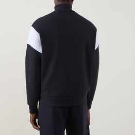 Model wearing Boss Green Label Union Skaz Zip Hoodie in dark blue, back view, with white contrast panel detail and ribbed trims.