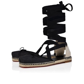 Christian Louboutin flat espadrille sandals in black with snake-effect ankle wrap laces, natural jute rope sole, no model.