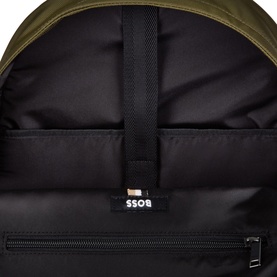 Hugo Boss Catch 3.0 Backpack in Open Green, interior view showing black padded lining, zip pocket, and BOSS branded label