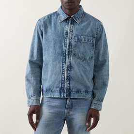 Model wearing Hugo Boss Orange Luney Denim Jacket in turquoise mid wash, with point collar, front zip and chest patch pocket, styled with blue jeans.