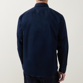 Model wearing Hugo Boss Orange Ricoplus Logo Casual Shirt in dark blue, rear view showing twill finish and long sleeves