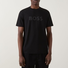 Model wearing Hugo Boss Orange Te Logo T-Shirt in black, crew neck, short sleeves, tonal BOSS logo print on chest