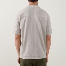 Model wearing Hugo Boss Orange light beige cotton crew neck T-shirt, back view showing relaxed fit and seam detail.
