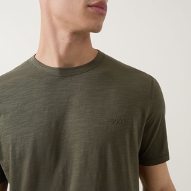 Model wearing Hugo Boss Orange Crew Neck T-Shirt in Bright Green, 100% cotton, with tonal embroidered logo on chest