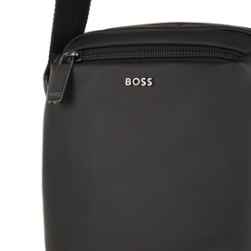 Hugo Boss Jace Messenger Bag in black, close-up showing zip fastening, gunmetal-tone hardware and silver BOSS logo detail