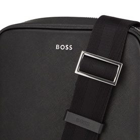 Hugo Boss black leather crossbody bag, silver-tone hardware buckle on adjustable black shoulder strap, embossed logo detail