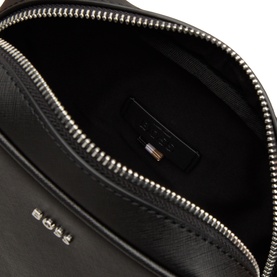 Hugo Boss black leather crossbody bag interior, showing zip closure with silver-tone hardware and branded interior label.