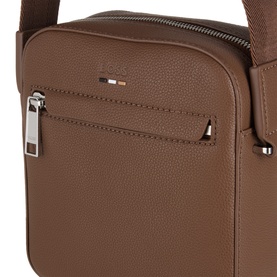 Hugo Boss RayNS Logo Reporter Bag in medium brown faux grained finish, showing exterior zip pocket and silver-tone hardware detail