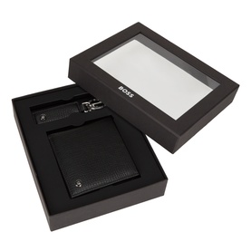 Hugo Boss black leather giftset in open box, containing a bifold cardholder and luggage tag with silver-tone hardware.