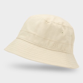Hugo Boss Finnian Logo Bucket Hat in light beige cotton with rubberised logo, narrow stitched brim and ventilation eyelets