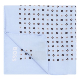 Hugo Boss light blue lyocell pocket square with small floral and geometric print pattern, folded flat showing BOSS logo