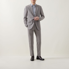 Model wearing Hugo Boss Dark Blue Single Cuff Slim shirt, styled with a light grey suit and black leather dress shoes.