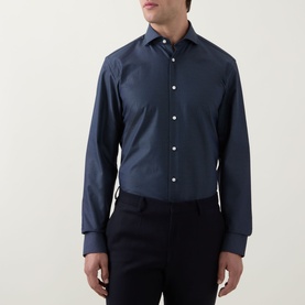 Model wearing Hugo Boss dark blue single cuff regular formal shirt in 100% cotton, styled with navy trousers