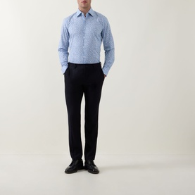 Model wearing Hugo Boss Light Blue Single Cuff Slim formal shirt, styled with black tailored trousers and black dress shoes.
